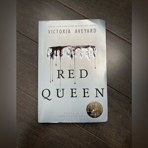 Red Queen Softcover book by Victoria Aveyard 
(Young Adult, Fantasy Fiction)